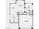 Open-concept floor plan showcasing the kitchen, dining area, great room and garage on the home's first floor at 9964 W Piccadilly Rd, Avondale, AZ 85392