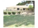 Picturesque backyard showing a well-manicured lawn and established landscaping, ideal for outdoor enjoyment at , Mesa, AZ 85205