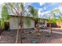 Attractive single-story home featuring xeriscaped front yard with interesting cacti and plants at 146 E 1St St, Mesa, AZ 85201
