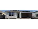 New construction home featuring a garage and classic architectural design at 15792 W Beryl Ave, Waddell, AZ 85355