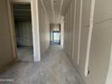 Hallway featuring modern design elements, ready for personalization and finishing touches at 15792 W Beryl Ave, Waddell, AZ 85355