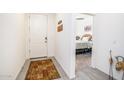 Bright foyer leading to a cozy bedroom, welcoming guests with style at 21150 N Evergreen Dr, Maricopa, AZ 85138