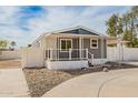 Comfortable home with shaded porch and carport, a blend of comfort and utility at 2388 S Vista Rd, Apache Junction, AZ 85119