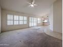 Sunlit living room with large windows and an open floor plan at 3833 W Rene Dr, Chandler, AZ 85226