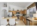 Well-lit kitchen featuring granite countertops and stainless steel appliances, great for cooking at 4223 E Wildcat Dr, Cave Creek, AZ 85331