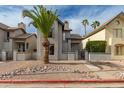 Stylish two-story home with stucco exterior, desert landscaping, and a gated front entrance at 1535 N Horne -- # 67, Mesa, AZ 85203