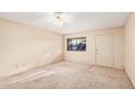 Neutral bedroom with large window and carpet at 1857 S El Marino Cir, Mesa, AZ 85202