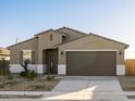 Beautiful one-story home featuring a two-car garage and a neutral color palette at 20319 N 224Th Dr, Surprise, AZ 85387