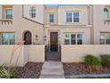 Charming townhome exterior with private gated patio entrance and attractive architectural details at 4077 S Sabrina Dr # 48, Chandler, AZ 85248