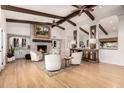 Stylish living room with fireplace and decorative beam ceilings at 4833 N 38Th St, Phoenix, AZ 85018