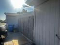 Side yard featuring a wooden fence and ample space, providing privacy and functionality at 7808 W Clarendon Ave, Phoenix, AZ 85033