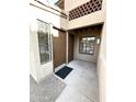 Inviting townhome entrance with a private patio area and security gate at 8625 E Belleview Pl # 1070, Scottsdale, AZ 85257