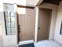 Inviting townhome entrance with a private patio area and security gate at 8625 E Belleview Pl # 1070, Scottsdale, AZ 85257