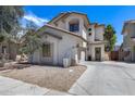 Beautiful two-story home featuring a two-car garage, desert landscaping, and a welcoming front entrance at 12107 N 66Th Ave, Glendale, AZ 85304