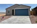 Charming single-story home with a two-car garage, well-maintained landscaping, and a welcoming facade at 17409 W Eva St, Waddell, AZ 85355