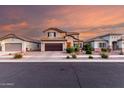 Attractive two-story home with landscaped front yard, providing a welcoming curb appeal in the neighborhood at 2607 W Gray Wolf Trl, Phoenix, AZ 85085