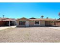 Cozy single-story home featuring a covered parking area and low maintenance landscaping at 3513 W Maryland Ave, Phoenix, AZ 85019