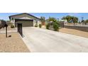 A charming single-Gathering home with a well-maintained exterior featuring a convenient two-car garage and a long driveway at 3806 N 23Rd Ave, Phoenix, AZ 85015