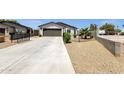 A charming single-Gathering home with a well-maintained exterior featuring a convenient two-car garage and a long driveway at 3806 N 23Rd Ave, Phoenix, AZ 85015