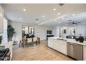 Spacious open-concept kitchen with modern appliances and adjacent dining area at 4698 E French Rd, San Tan Valley, AZ 85143