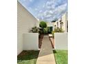 A nicely landscaped walkway leads to the front door of the home at 7214 N Via De La Siesta --, Scottsdale, AZ 85258