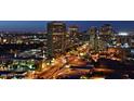 Nighttime city view showcases the vibrant lights and architecture of downtown at 2323 N Central Ave # Ph D, Phoenix, AZ 85004