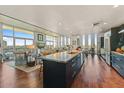 Open-concept kitchen featuring an oversized island and walls of floor to ceiling windows and scenic views at 2323 N Central Ave # Ph D, Phoenix, AZ 85004