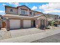 Charming two-story home featuring a three-car garage and a well-maintained, xeriscaped front yard for low maintenance at 2831 W Margy Ct, Phoenix, AZ 85017