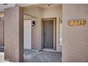 Inviting front entryway with a decorative security door and tiled porch, leading into a well-maintained home at 2831 W Margy Ct, Phoenix, AZ 85017