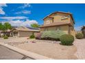 Residential home featuring desert landscaping, rock features and blue sky at 30013 N Candlewood Dr, San Tan Valley, AZ 85143