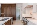 Modern kitchen featuring wood cabinets, stainless steel appliances and a functional layout at 3145 E Boot Track Trl, Gilbert, AZ 85296
