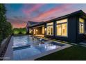 Backyard pool and spa with manicured landscaping at 3145 E Boot Track Trl, Gilbert, AZ 85296