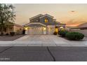 Beautiful two-story home featuring a three-car garage and well-manicured landscaping at 3634 S Danielson Way, Chandler, AZ 85286
