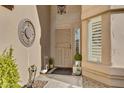 Charming front entrance featuring a decorative security door, stucco walls, and decorative features at 4019 W Charlotte Dr, Glendale, AZ 85310