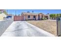 Wide driveway leading to a cozy single-story home with xeriscaped front yard at 6939 W Cambridge Ave, Phoenix, AZ 85035