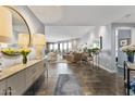 Bright open concept condo with modern gray walls, tile floors and stylish furniture at 1040 E Osborn Rd # 1103, Phoenix, AZ 85014