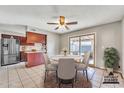 Cozy dining area with sliding glass doors leading to the outdoor living space at 1243 E Susan Ln, Tempe, AZ 85288