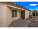 Back porch features a covered entry and desert landscaping at 16044 S 41St Pl, Phoenix, AZ 85048