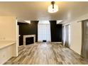 Bright living room with tile floors, fireplace, curtains and plenty of natural light at 2333 E Southern Ave # 1101, Tempe, AZ 85282