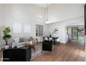 Open-concept living space filled with modern furniture and lots of natural light at 4030 E Prickly Pear Trl, Phoenix, AZ 85050