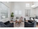Inviting living space with stylish decor, high ceilings, and contemporary furniture at 4030 E Prickly Pear Trl, Phoenix, AZ 85050