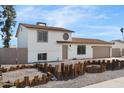 Charming two-story home with a tidy front yard and attached two-car garage at 4629 E Southern Ave, Phoenix, AZ 85042