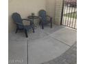 Cozy outdoor seating area with chairs and a small table at 5435 W Christy Dr, Glendale, AZ 85304