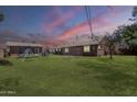 Spacious grassy backyard perfect for outdoor activities and relaxation at 618 N Stapley Dr, Mesa, AZ 85203