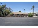 A full view of the home and street at 618 N Stapley Dr, Mesa, AZ 85203