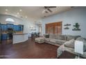 Open-concept living room and dining area offers plenty of space for entertaining at 12503 W Vista Paseo Dr, Litchfield Park, AZ 85340