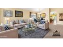 Comfortable living room featuring stylish furniture, elegant decor, and abundant natural light at 1049 N Monterey St, Gilbert, AZ 85233