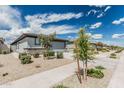 Street view features single-Gathering homes with desert landscaping and private garages at 17376 W Via De Luna Dr, Surprise, AZ 85387