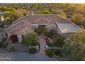 Expansive single Gathering house with a red tile roof, desert landscaping, mountain views, and outdoor seating at 24158 N 78Th Pl, Scottsdale, AZ 85255