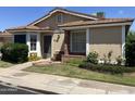 Attractive single-story home with a well-kept lawn and inviting entrance at 314 E Campo Bello Dr, Phoenix, AZ 85022